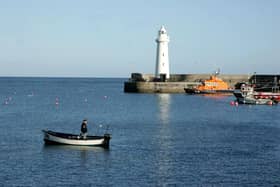 Donaghadee harbour with lighthouse and lifeboat pictured in November 2009. Picture: News Letter archives/Brian Little