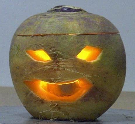 A Halloween lantern carved from a humble turnip