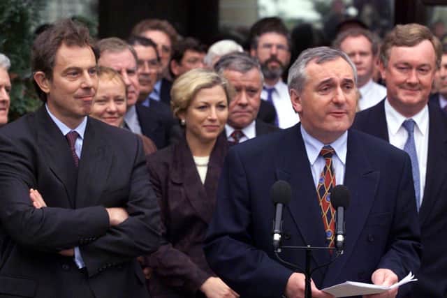 1998:  UK Prime Minister Tony Blair listens as Ireland’s Taoiseach Bertie Ahern at Stormont announces that the two governments want formation of a power-sharing Executive. But the assembly’s performance over the 25 years since then has been a disaster, with it not even sitting for 40% of the time