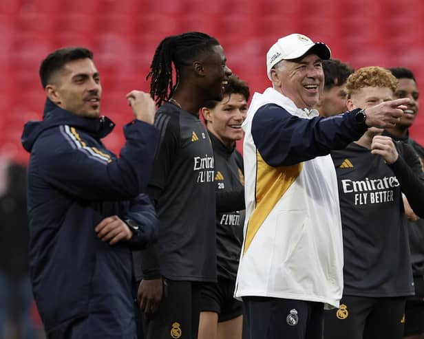 Real Madrid head coach Carlo Ancelotti relaxed during a training session ahead of the Champions League final between Borussia Dortmund and Real Madrid at Wembley Stadium in London.(AP Photo/Ian Walton)