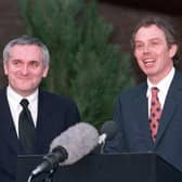 Prime Minister Tony Blair and his Irish counterpart Bertie Ahern emerge from Castle Buildings to announce the signing of the Belfast Agreement in 1998