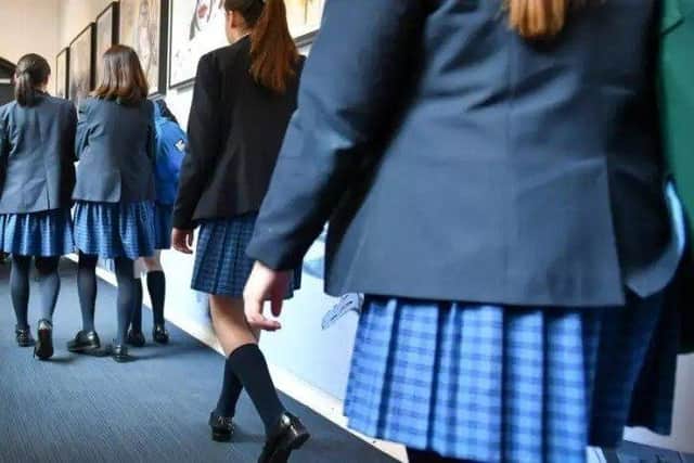 Schools must alter uniform policies to give girls the choice of wearing skirts or trousers.