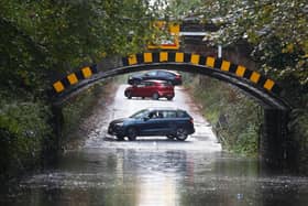 Flooding on the Ballysallagh road in Co Down. Road closures are in place and some public transport services have been cancelled as heavy rain continues to fall across Northern Ireland. Photo: Jonathan Porter / Press Eye