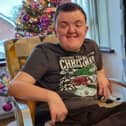 The parents of Paul Russell from Dromore, who died in June 2020 , aged 23, have set up a social club for adults with learning and physical disabilities called The Pringle Club - named after Paul's favourite crisps.