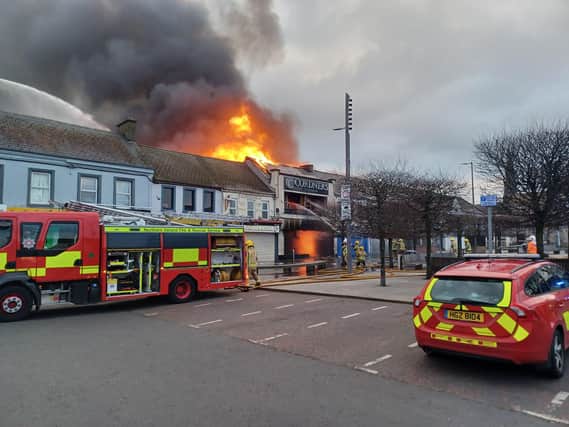 The shoe shop ablaze as of this morning