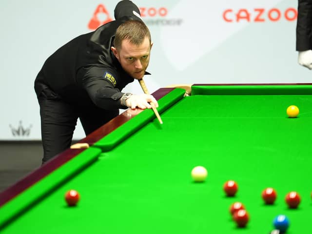 Mark Allen in action against Robbie Williams (not pictured) at the Cazoo World Snooker Championship at the Crucible Theatre, Sheffield