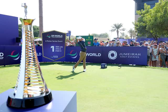 Northern Ireland’s Rory McIlroy plays his tee shot on the first hole during day two of the DP World Tour Championship in Dubai. McIlroy finished his round with two birdies and an eagle to sit seven shots off the lead.