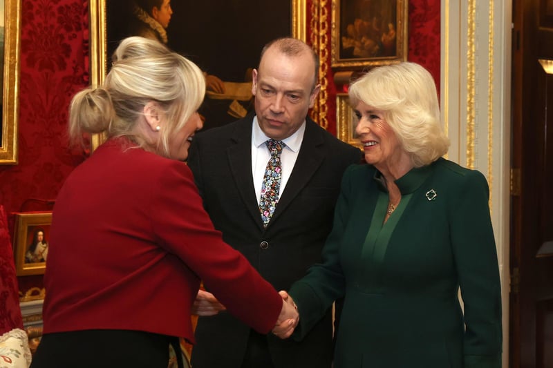 Queen Camilla (right) meets First Minister Michelle O'Neill (left) with Northern Ireland Secretary Chris Heaton-Harris (centre)