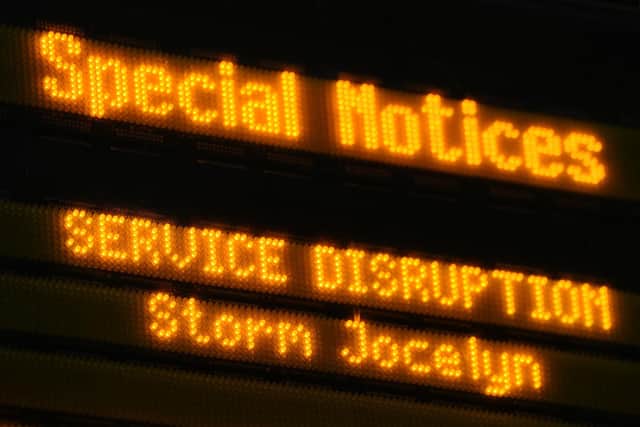 An information sign at Edinburgh Waverley train station as rail services to and from Scotland have been suspended until at least noon on Wednesday.