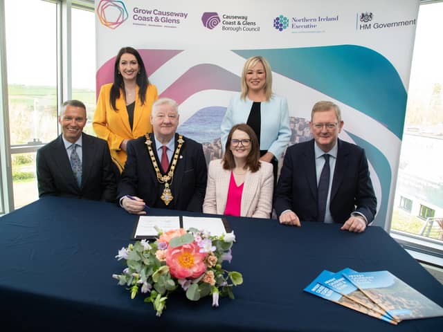 The First and Deputy First Ministers Michelle O'Neill and Emma Little-Pengelly pictured with Finance Minister Dr Caoimhe Archibald, Mayor of Causeway Coast and Glens Council Cllr Steven Callaghan, Council Chief Executive David Jackson and Lord Caine, Parliamentary Under Secretary of State for Northern Ireland at the signing of the deal. Credit Causeway Coast and Glens Council