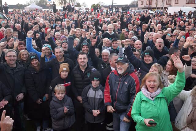 Michael Dunlop celebrates with fans at a homecoming event in Ballymoney on Saturday held to mark his record-breaking 29 wins at the Isle of Man TT