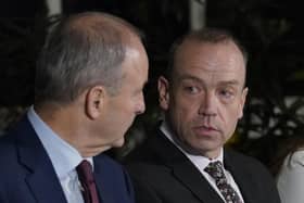 In his letter Chris Heaton-Harris (right) challenged Tanaiste Micheal Martin (left) to set out the Dublin government's action on Troubles legacy prosecutions