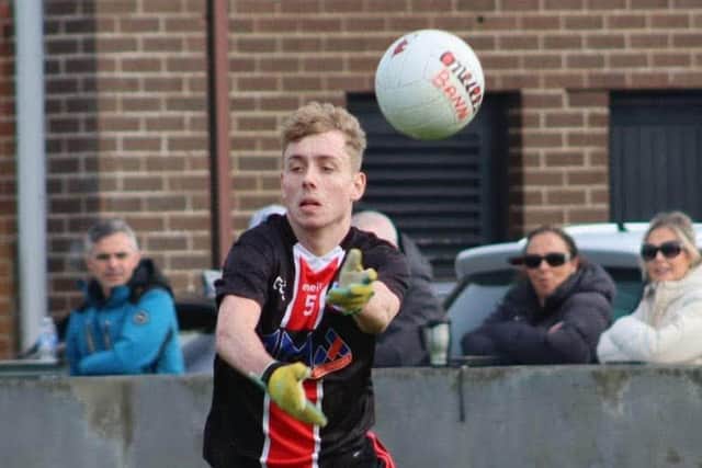 Taylor Hill in action on the GAA pitch.
