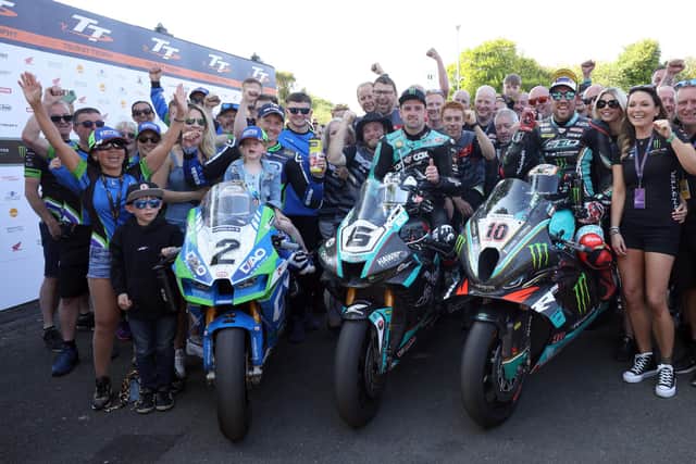 Superbike TT winner Michael Dunlop (Hawk Racing Honda) with (right) runner-up Peter Hickman (Monster Energy by FHO Racing BMW) and third-placed Dean Harrison (DAO Racing Kawasaki). Picture: Stephen Davison/Pacemaker Press