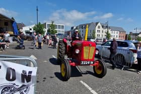 In this video we see the tractors leaving the square for their tractor run during the Ballyeaston Vintage Tractor Club gathering at Ballyclare Square. Picture: Darryl Armitage