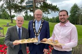 A new restaurant and bar has opened at Castlereagh Hills Golf Course.  The Hills Bar & Restaurant, founded by entrepreneur and owner of Dished Up Deli catering company Philip Davison, has created 10 new jobs for the venue with plans to add to the team throughout the summer. Pictured are councillor Thomas Beckett, chair of Lisburn & Castlereagh City Council’s communities & wellbeing committee pictured alongside the mayor of Lisburn & Castlereagh City Council, councillor Andrew Gowan and director of The Hills Bar & Restaurant Philip Davidson.