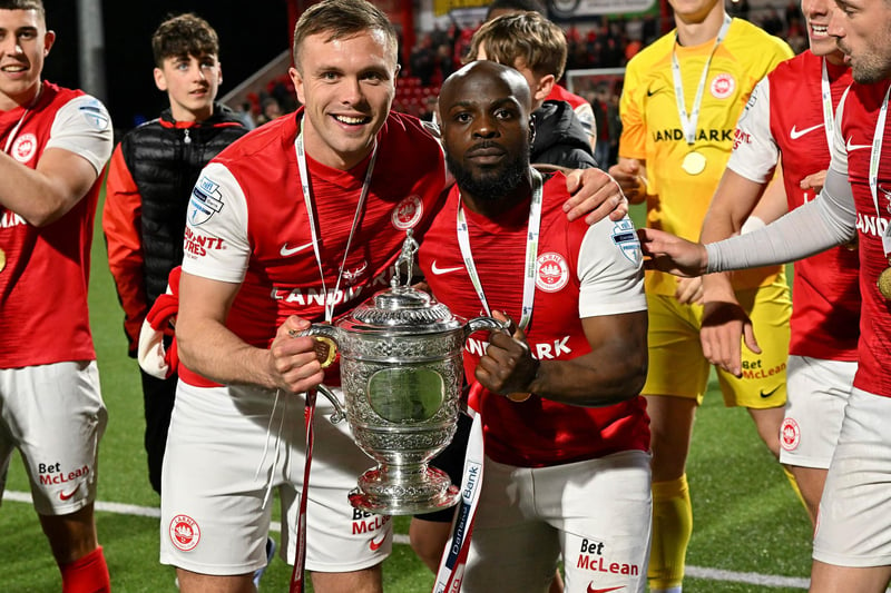 Graham Kelly and Fuad Sule with the Gibson Cup. Both players have since left Larne, moving on to Coleraine and Glentoran respectively