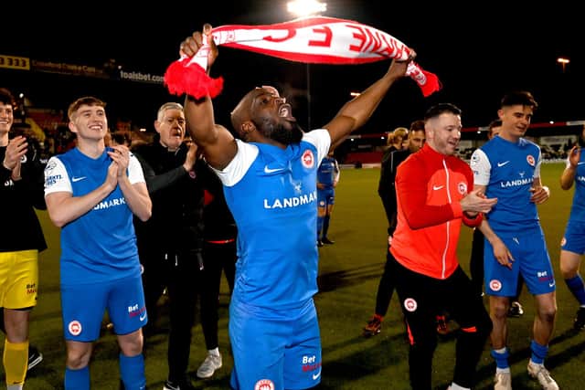 Fuad Sule enjoying the scenes in front of Larne supporters at Seaview following Friday’s title-winning victory