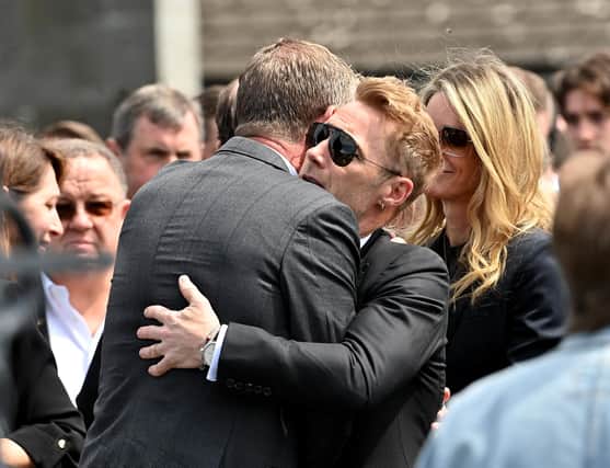 Ronan Keating and wife Storm (right) outside St Patrick's Church in Louisburgh, Co Mayo, after the funeral of his brother Ciaran Keating. The older brother of Ronan Keating died in a two-car crash near Swinford in Co Mayo. Photo: Oliver McVeigh/PA Wire