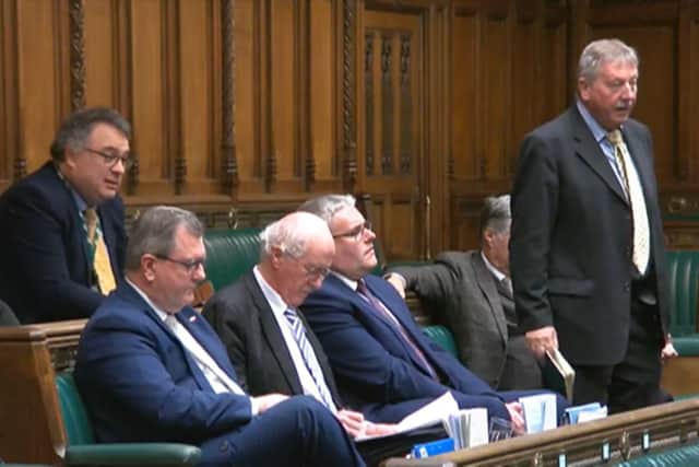 Sammy Wilson speaking in the Commons (with Stephen Farry on the left)