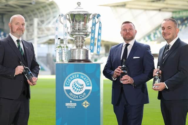 Ross Lazaroo-Hood and Sitki Gelmen from Clearer Water announce the company’s long-term sponsorship of the Irish Cup alongside Stephen Bogle (left), Head of Sales and Marketing at the Irish FA