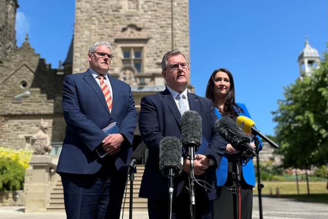 DUP leader Sir Jeffrey Donaldson along with party colleague Gavin Robinson and Emma Little Pengelly outside Stormont Castle after a meeting with the head of the NI Civil Service Jayne Brady