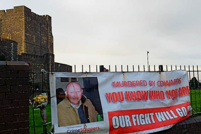 The Glenn Quinn murder banner by Carrickfergus Castle