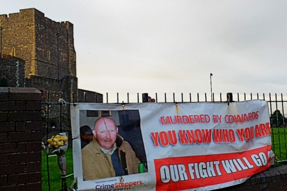 Banner appears in central Carrickfergus telling Glenn Quinn's murderers 'our fight for justice goes on'
