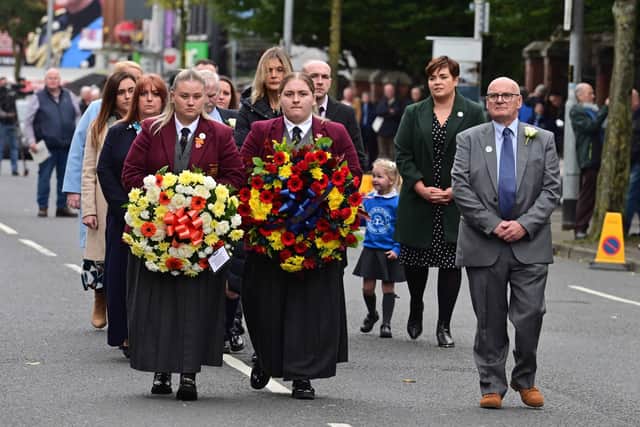 School  children lay wreaths during a Memorial Service which took  place at West Kirk Presbyterian Church,  A new memorial has been unveiled at the site of the Shankill Road bomb on the 30th anniversary of the blast. The hands of the clock are stopped at 13:06, the time the bomb detonated at Frizzell's fish shop on the street in west Belfast in 1993. Nine trees have also been planted in the garden beside West Kirk Presbyterian Church - marking the nine victims. At the base of each tree is a plaque with a tribute from family members. Pic Colm Lenaghan/Pacemaker