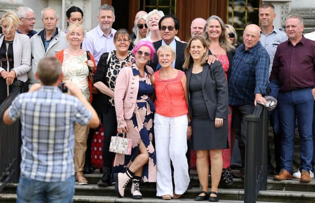 Anti-COVID 19 vaccination Londonderry GP Anne McGloskey (front centre) appears at Belfast High Court where she was challenging her suspension from medical practice