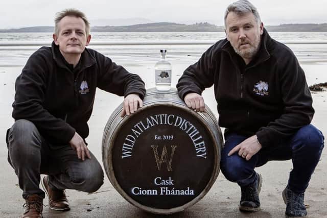Brian Ash, left, and Jim Nash of Wild Atlantic Distillery on the beach along the Wild Atlantic Way in Co Clare