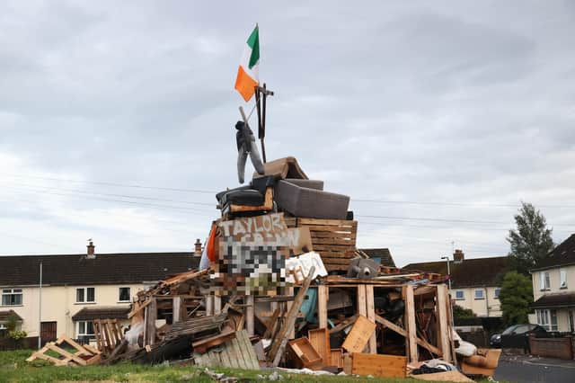 An effigy above a poster with a councillor’s name in Rathcoole, Newtownabbey. Such scenes have been widely condemned. Jamie Bryson writes: "I believe burning flags is a legitimate form of political protest and markedly different than the personal targeting of individuals"