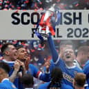 Rangers' Steven Davis holds the trophy aloft after the Scottish Cup Final win over Hearts at Hampden Park in 2021
