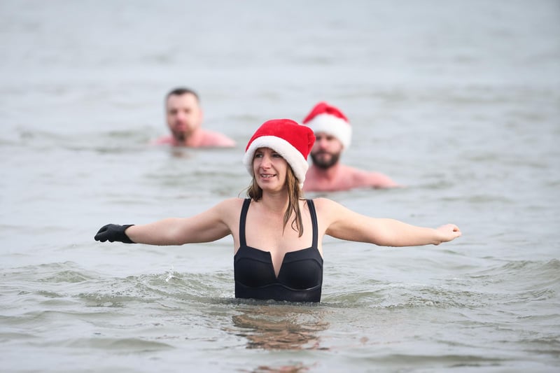 Swimmers from north Down take part in the annual Santa Splash at Helens Bay beach, County Down.