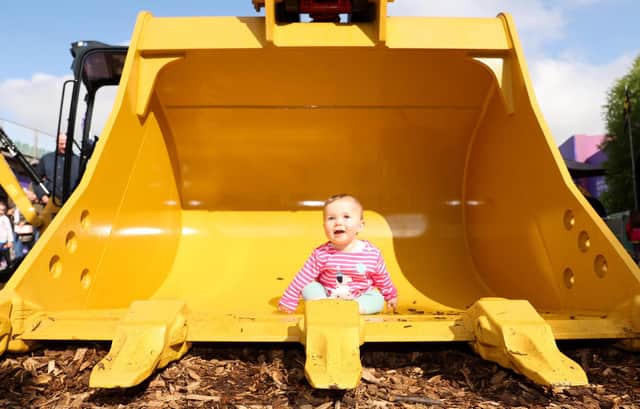 Six-months-old Louisa Porter checks out the heavy machinery on offer. Picture by Jonathan Porter/PressEye