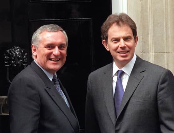 Prime Minister Tony Blair (right) greets his Irish counterpart  Bertie Ahern at Downing Street, London. Blair warned Bertie Ahern in July 1997 that the peace talks may "lose all credibility" if they did not move forward, archive files have revealed.