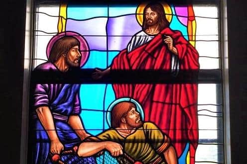 General image of Christ, depicted in stained glass; source - 'Holy Spirit Catholic Church, stained glass window on the side of the sanctuary, by Holyspiritlakewales, marked as public domain'