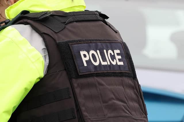 A suspected petrol bomb has been thrown at a police vehicle in Londonderry
