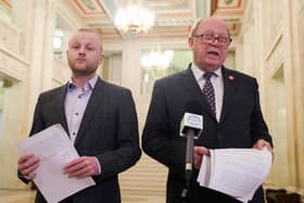TUV leader Jim Allister and loyalist activist Jamie Bryson pictured in Parliament Buildings at Stormont on Friday. Mr Bryson is planning to challenge whether new government legislation restores the 'core constitutional provisions' of the Acts of Union