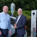Leading electric vehicle (EV) infrastructure company Weev has partnered with Rushmere Shopping Centre to charge up the retail landscape in Co Armagh by providing four new public charging stations. Pictured are Thomas O'Hagan, CCO, Weev and Martin Walsh, centre manager, Rushmere Shopping Centre