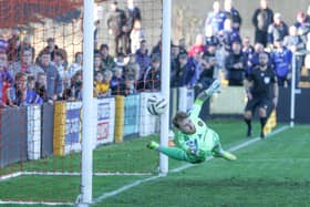 Carrick Rangers goalkeeper Nathan Gartside with a superb save to deny Linfield's Chris Shields off the penalty spot in a 2-2 draw at Taylors Avenue. (Photo by Desmond Loughery/Pacemaker Press)