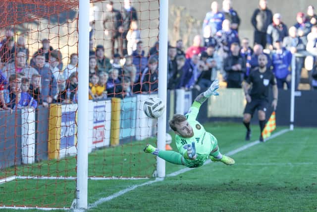 Carrick Rangers goalkeeper Nathan Gartside with a superb save to deny Linfield's Chris Shields off the penalty spot in a 2-2 draw at Taylors Avenue. (Photo by Desmond Loughery/Pacemaker Press)
