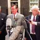 Ulster Unionist Party leader David Trimble (centre), his deputy John Taylor (left) and Party spokesman, Ken Maginnis speak to the media outside Downing Street following talks with Prime Minister Tony Blair.