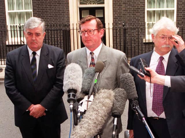 Ulster Unionist Party leader David Trimble (centre), his deputy John Taylor (left) and Party spokesman, Ken Maginnis speak to the media outside Downing Street following talks with Prime Minister Tony Blair.