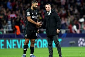 Celtic manager Brendan Rodgers and Cameron Carter-Vickers (left) commiserate at the final whistle following a chastening 6-0 Champions League defeat against Atletico Madrid on Tuesday