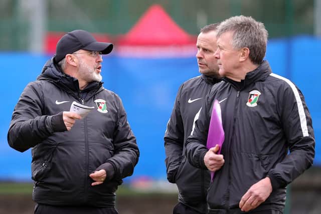 Mick McDermott (left) has been replaced by Rodney McAree (centre) as Glentoran first-team manager