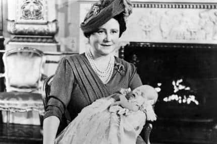 Baby Charles with the Queen Mother in 1948