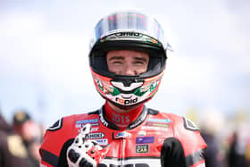 Glenn Irwin smiles for the camera during the opening NW200 practice session