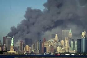 Smoke billows over New York on 9/11 (Press Association)