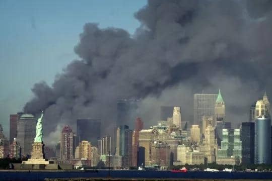 Smoke billows over New York on 9/11 (Press Association)